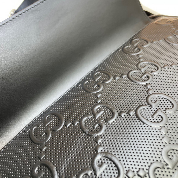 G*u*i gg embossed messenger bag