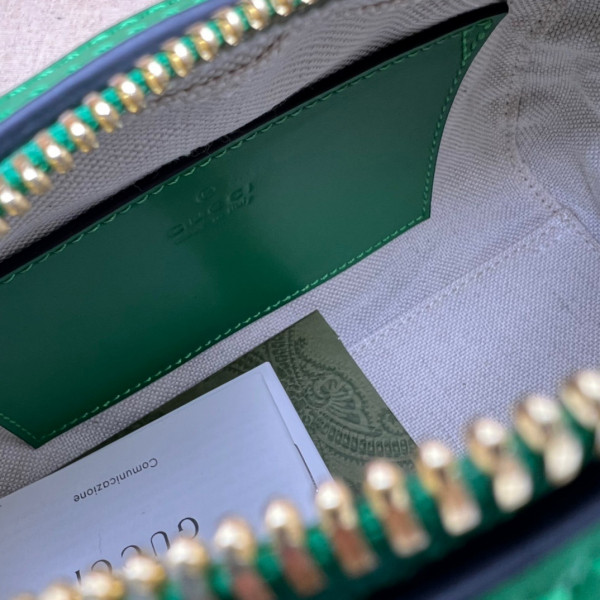 G*u*i gg matelassé leather top handle bag