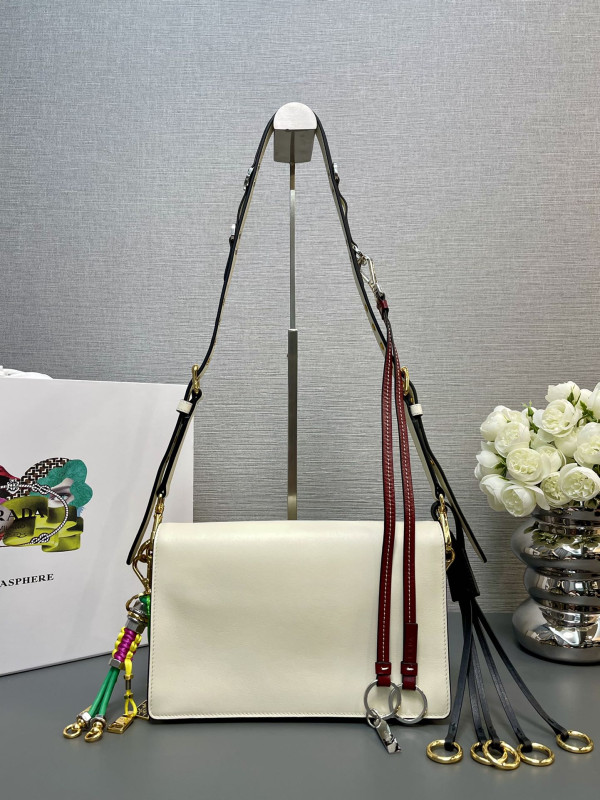 Pra*a soft sound small leather shoulder bag with charms